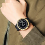 Digital watch on a wrist with a green jacket background