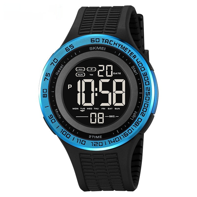 Digital watch with black strap and blue bezel on a white background