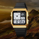 Gold digital watch with black strap on a mountainous background